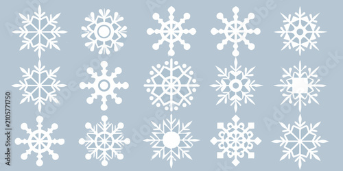 Tableau sur toile Variety Of White Snowflake Designs On A Light Blue Background Vector Illustratio