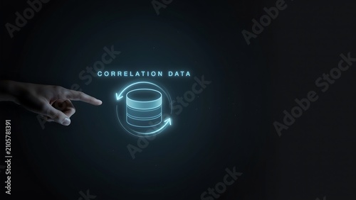 Digital finger pointing at interactive database icon representing data correlation