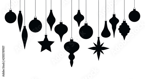 Silhouetted christmas ornament decorations hanging from strings in a festive display with various shapes with black silhouettes various, against white background
