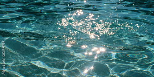 Rippling water surface with sunlight reflections