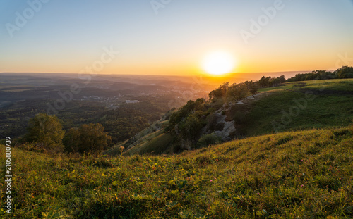 View of the mountains and Kislovodsk from the observation decks of the Kislovodsk Park. Evening sunset over the mountains of Kislovodsk.
