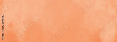 Plain peach colored paper texture surface solid background abstract simple light orange pattern.