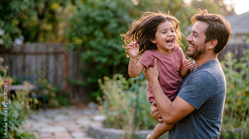 divorced Latino father holds his daughter, rejoices reunion, divorce lawyer's service concept peaceful transfer child between co-parents, copy space respecting rights parents children after divorce