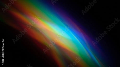 Vibrant multicolored light waves on black background