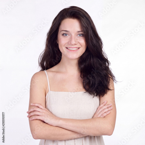 Beauty portrait of young beautiful brunette woman with bare shoulders