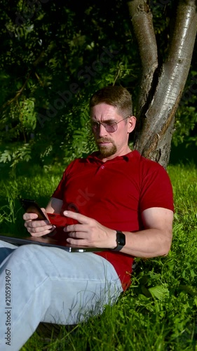 A man makes a card payment on a computer