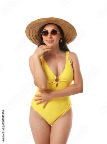 Foto Beautiful woman wearing yellow swimsuit on white background