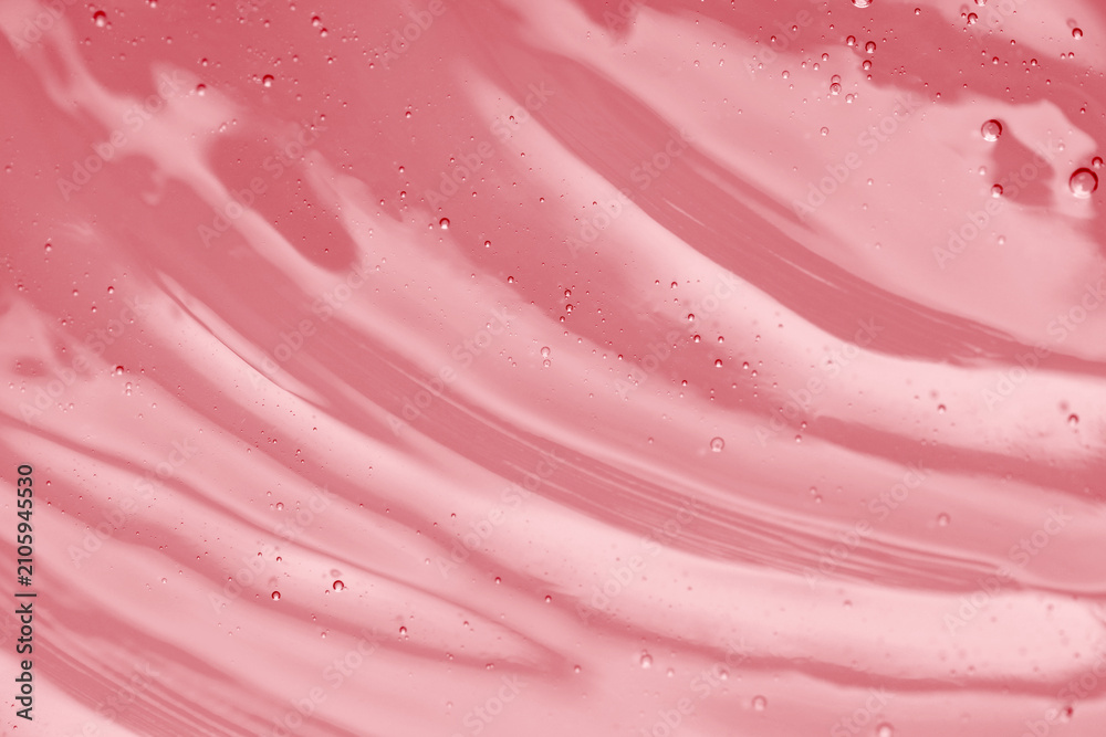 Obraz premium Pink transparent cosmetic product as background, closeup