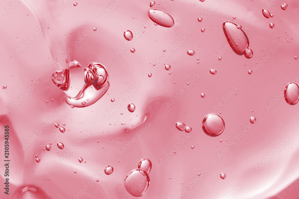 Naklejka premium Pink transparent cosmetic product as background, closeup