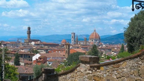 Florence skyline showing duomo and palazzo vecchio from bardini garden. Beautiful panoramic view of florence city center with its iconic landmarks, including brunelleschi's dome and palazzo vecchio