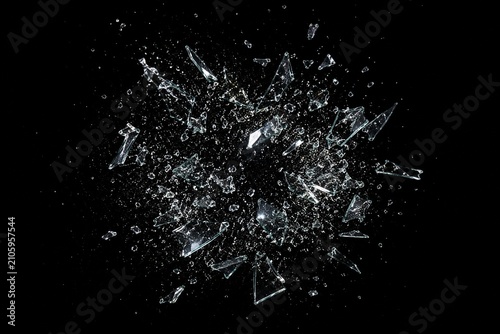 Shattered Glass Fragments on Black Background