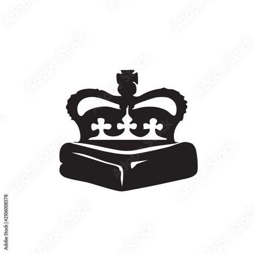 фотографія Black royal crown icon sitting on a velvet cushion