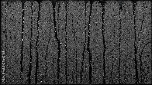 Realistic water droplets dripping down a glass surface texture for video overlay and blending effects.