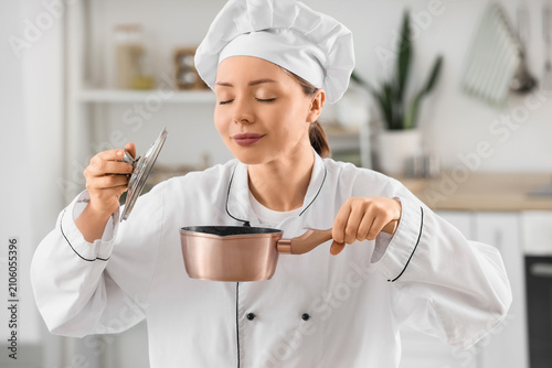 Female chef in a white unif...