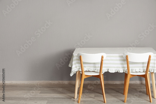 Dining table with striped t...