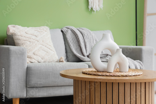 Vases on wooden coffee tabl...