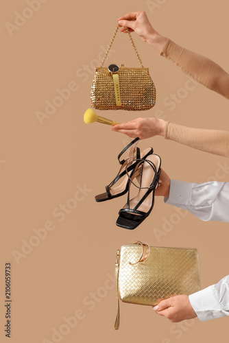 Female hands holding stylis...