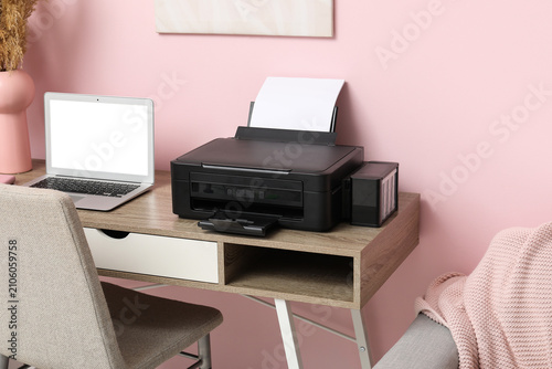 Modern printer with laptop ...