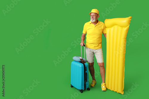 Mature male traveler with s...