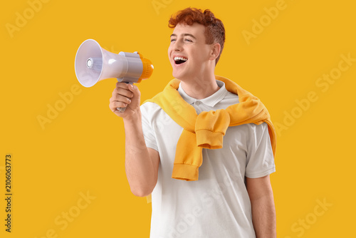 Young redhead man shouting ...
