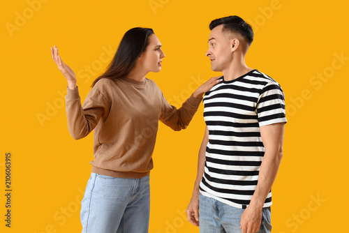 Young couple quarreling on ...