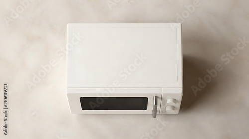 A top down view of a clean white microwave oven on a neutral surface.