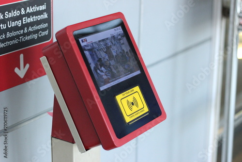 Fotografía Electronic ticket machine screen at train station gate