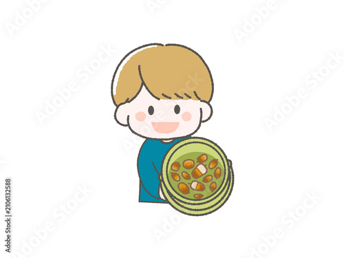 バケツいっぱいのどんぐりを持つ男の子
