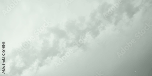 Tableau sur toile Industrial smoke plumes billow from a hidden source, creating abstract patterns against a muted, overcast sky, hinting at atmospheric pollution and the environmental impact of industry
