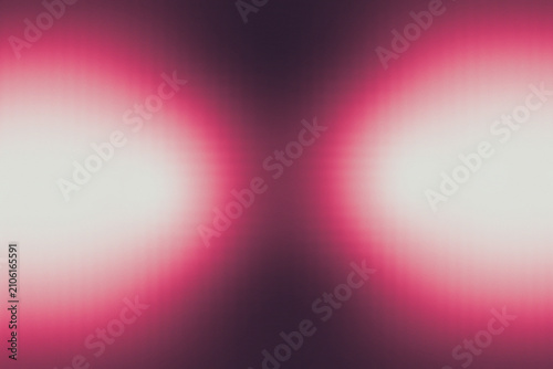 Cuadro en lienzo Abstract symmetrical glowing pink and white light flares on dark background