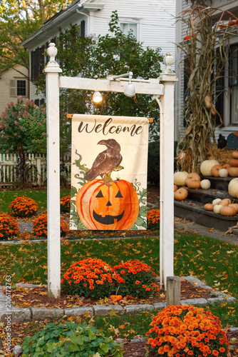 A Halloween welcome sign placed in a house front yard in Woodstock, Vermont