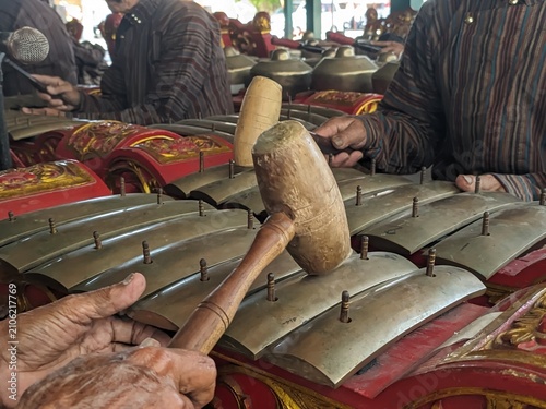 Javanese gamelan musical instruments being played
