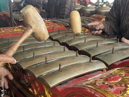 Javanese gamelan musical instruments being played
