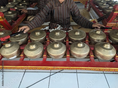 Javanese gamelan musical instruments being played
