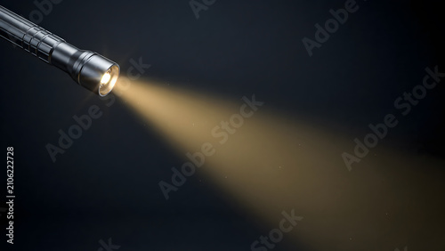 A bright flashlight shining a warm beam of light into the dark void