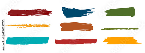 Brush strokes vector set. Horizontal collection of nine colorful grunge paint smears, stripes, and dabs isolated on white background. Flat vector illustration for modern art, design, and banners.