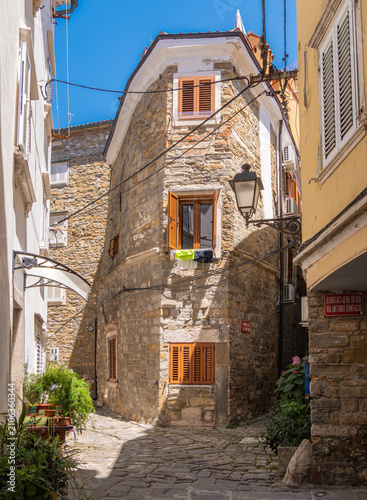 Narrow stone alley in an old european town