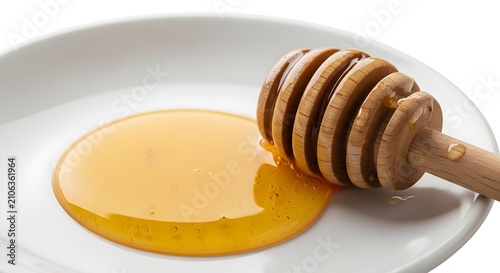 Honeycomb and honey drizzle on a white plate with a portion of honey remaining in the comb.