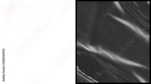 Foto Crumpled plastic wrap texture on black background, wrinkled transparent film ove