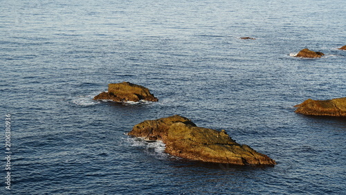 Картината върху платно Dramatic Volcanic Cliffs and Lighthouse at Cape Irozaki on the Izu Peninsula, Ja