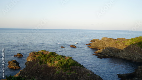 Принти на полотні Dramatic Volcanic Cliffs and Lighthouse at Cape Irozaki on the Izu Peninsula, Ja