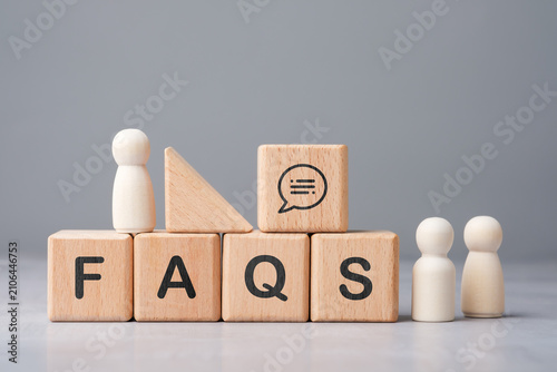 Konstfotografi FAQs concept with wooden blocks representing frequently asked questions, custome