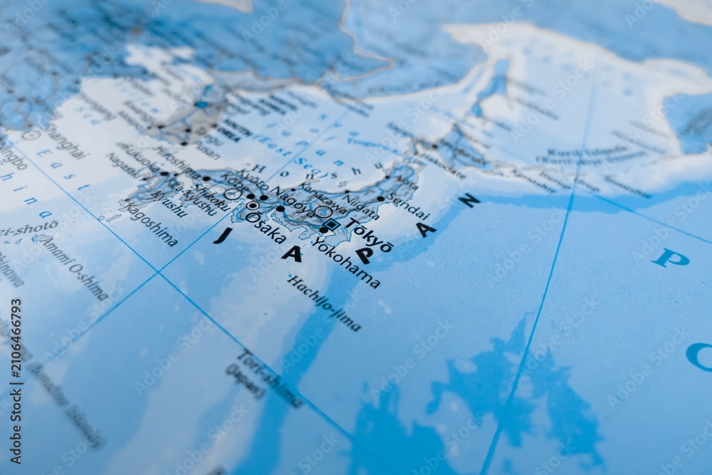 Obraz premium Map of Japan styled in grey color. Selective focus on label, close-up view