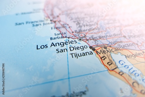 Map of San Diego with flare from top right corner. Selective focus on label, close-up view