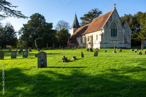 Fotografie Historic Farringdon parish church and its ancient yew tree, Hampshire, England