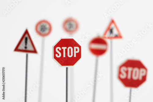 Miniature stop sign on white background