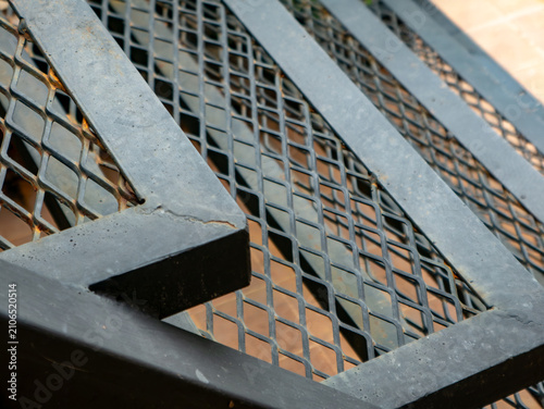 Industrial Expanded Metal Mesh Staircase Grating, Rusty Steel Texture Close-Up