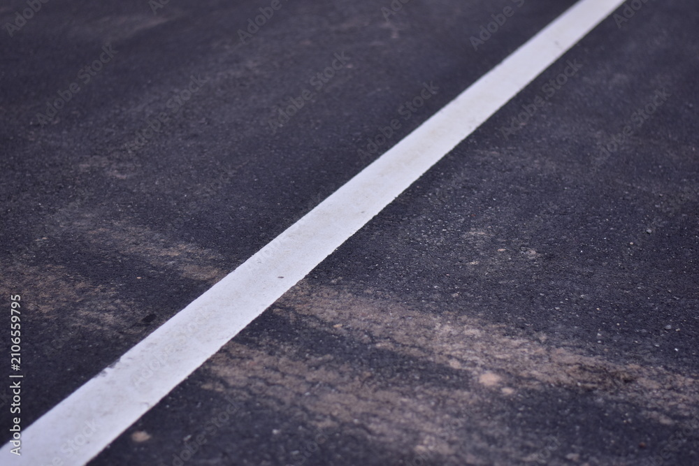 Fototapeta premium black asphalt road and white dividing lines, Asphaltic concrete road with yellow and white traffic lines, asphalt, road, surface, traffic, street, transportation, black, white, background, highway, li
