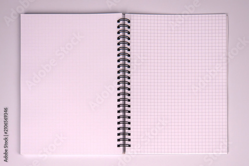 Quadro su tela Spiral notebook with blank graph paper pages, central focus, simple clean settin