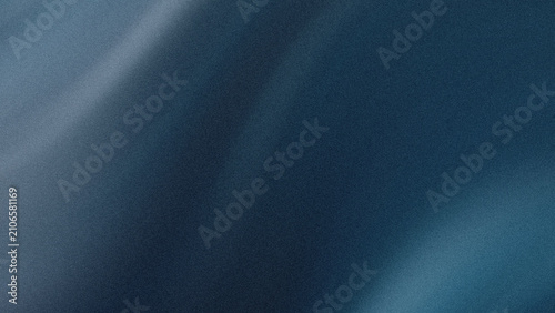 A close up view of smooth dark blue fabric texture featuring subtle folds and soft lighting